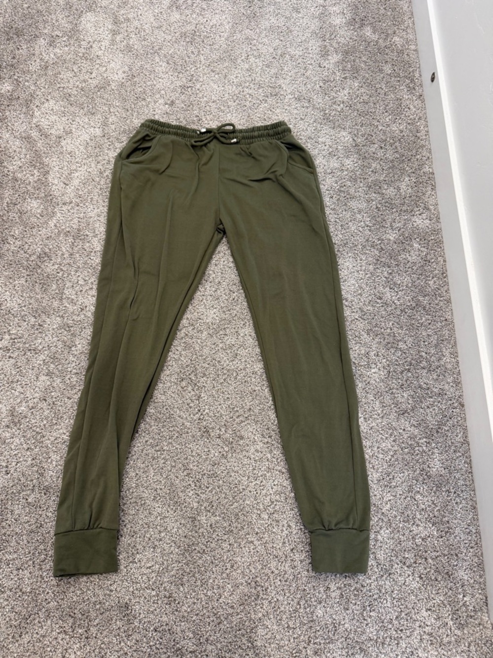 green sweatpants